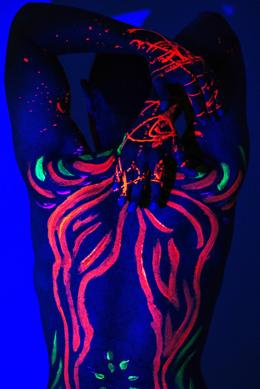 person with neon body art